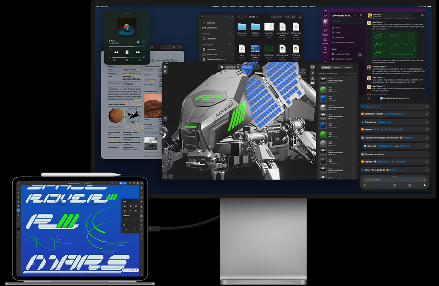 iPad Pro conectado a un Magic Keyboard, parte frontal, ambos conectados a un monitor Mac Studio Display externo, la pantalla del iPad Pro muestra una app de diseño gráfico, colores vivos y texto, el monitor Studio Display muestra varias apps y un modelo en 3D