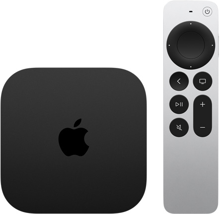 Apple TV 4K v černé barvě, pohled shora, s dálkovým ovladačem Apple TV Remote ve stříbrné barv