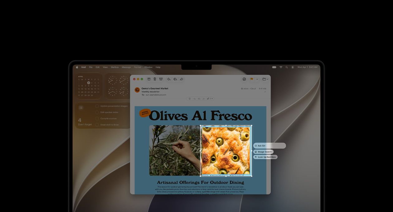 14palcový MacBook Pro, vesmírně černý, ukázka vizuální inteligence s e‑mailem, který obsahuje obrázky jídla a bylinek, obrázek oliv v chlebu ohraničuje rámeček a nad ním se zobrazují tři prompty: Ask Siri, Image Search, and Look Up Nutrition