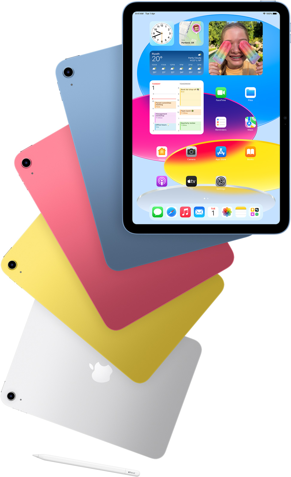Front view iPad shows the home screen with blue, pink, yellow, and silver rear-facing iPads. An Apple Pencil sits nears the arranged iPad models.