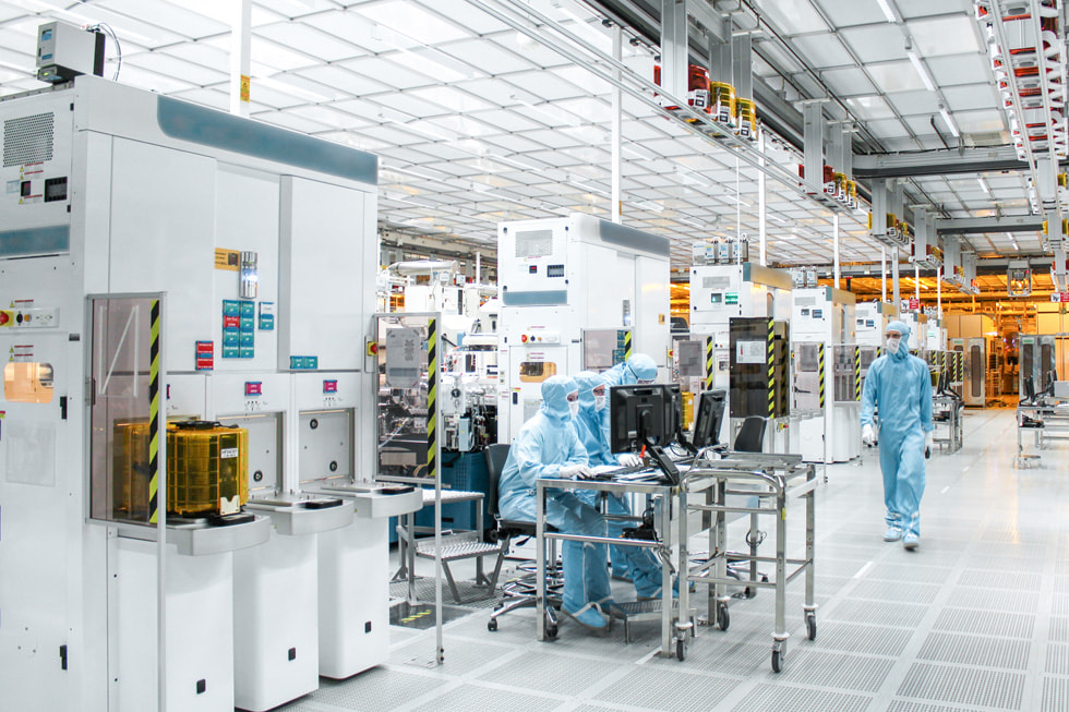 Two technicians are shown.