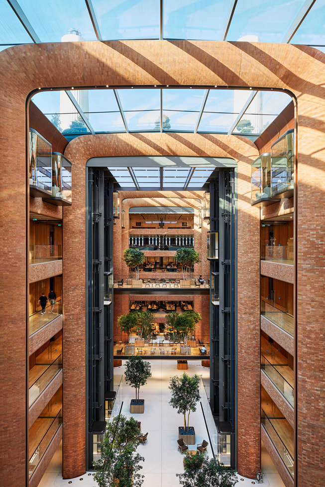 An interior shot of Battersea Power Station, Apple’s U.K. headquarters, including its glass ceiling.