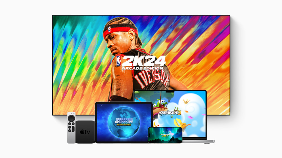 New Apple Arcade games NBA 2K24 Arcade Edition, Cut the Rope 3, Jeopardy! World Tour+, and Crossword Jam+ are shown on Apple TV, iPad Pro (6th generation), iPhone 15 Pro, and MacBook.