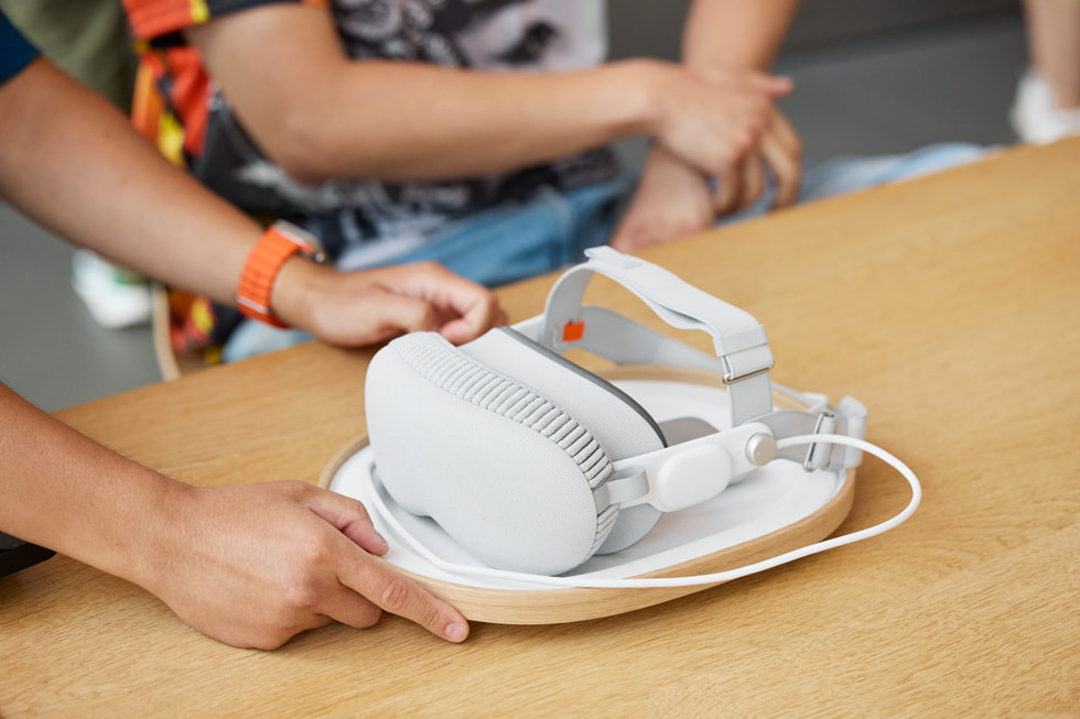 A close-up Apple Vision Pro on a table at Apple Wangfujing.