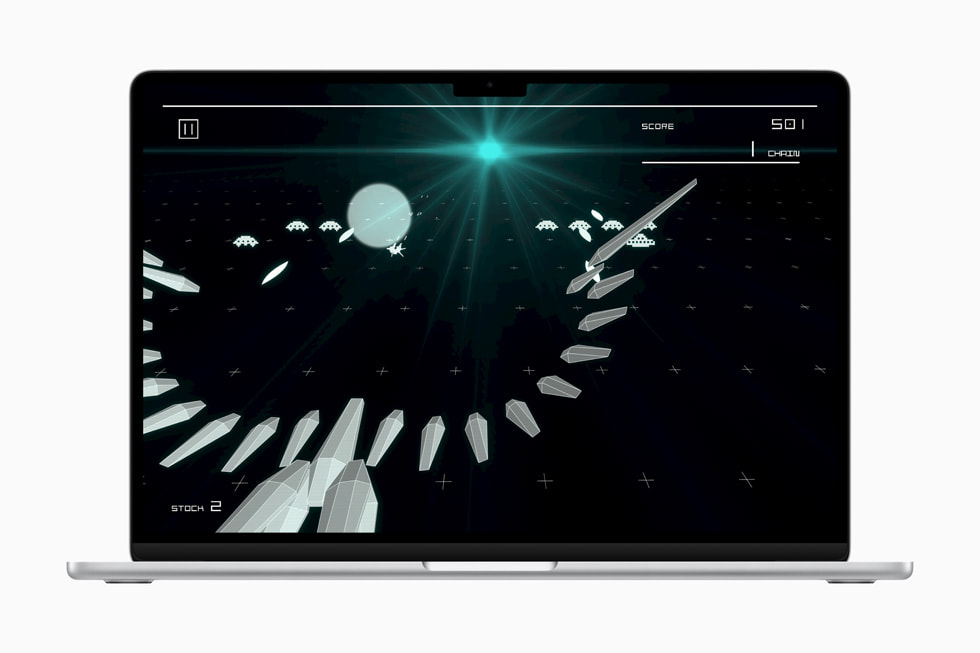 A still from Space Invaders Infinity Gene Evolve by TAITO CORPORATION. Shown on MacBook Air.