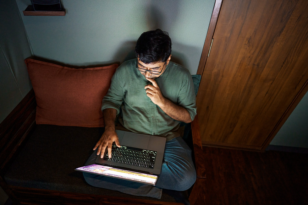 Vyas uses MacBook Pro to review audio for Mangya.