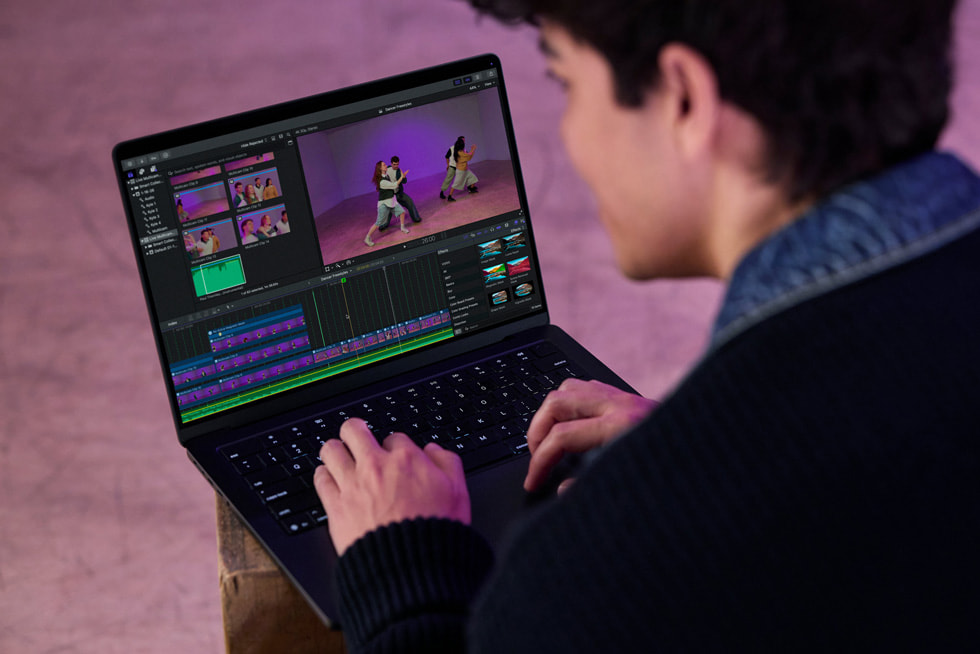 An over-the-shoulder close-up of Kyle Hanagami working in Final Cut Pro on MacBook Pro.