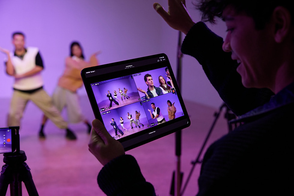 Kyle Hanagami directs dancers in a studio setting, reviewing the action on iPad Pro using Live Multicam in Final Cut Pro.