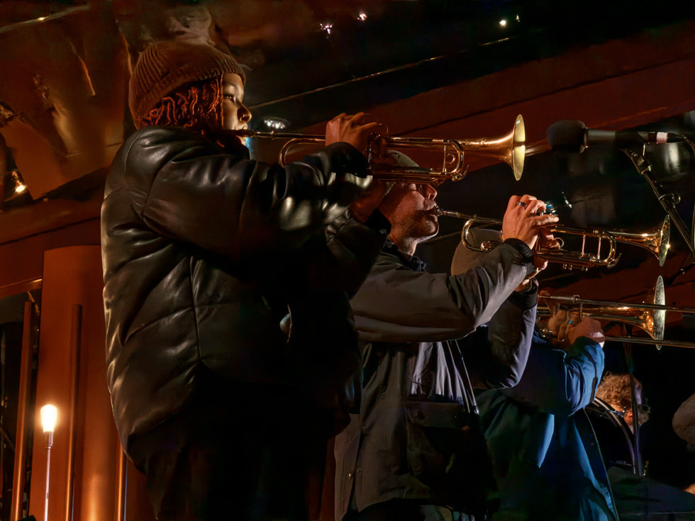 Musicians shown performing with Mumford & Sons at Apple Battersea in London.
