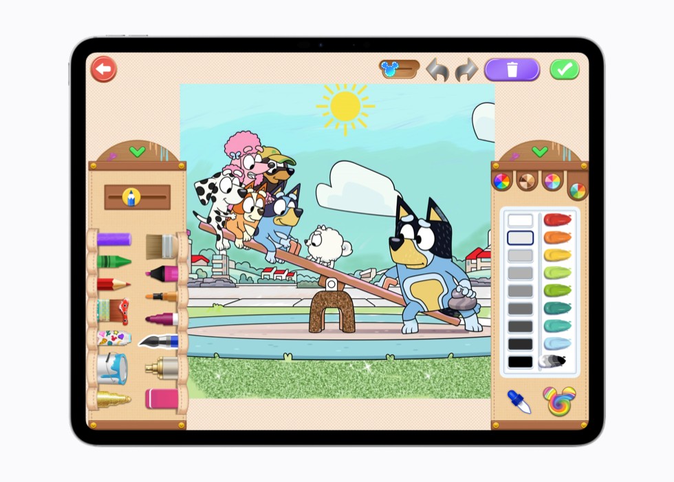Un’istantanea di Disney Coloring World+ su iPad che mostra una pagina da colorare con due personaggi di “Bluey” su un’altalena.