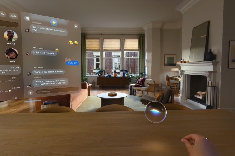 An Apple Vision Pro user’s view shows a 3D visualization they can use to invoke Siri.