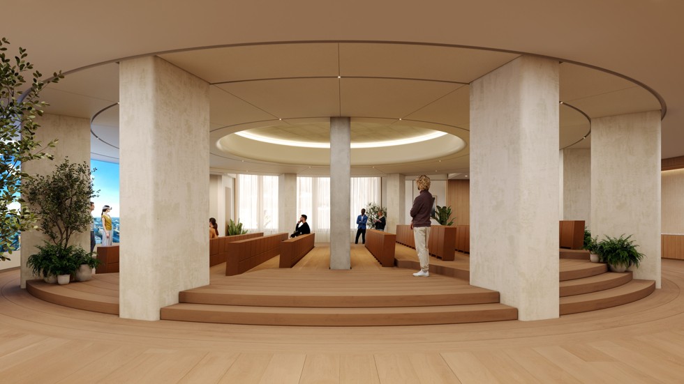Ein grosses, kreisförmiges Auditorium mit einem Präsentationsbereich auf der linken Seite
