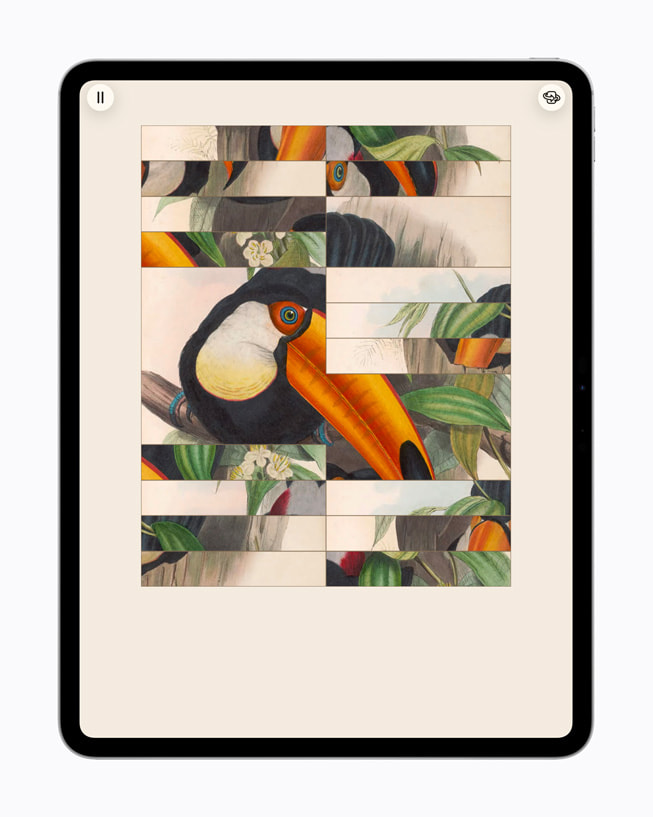A scrambled puzzle of a bird from Art of Fauna: Cozy Puzzles+ is displayed on an 13-inch iPad Pro.