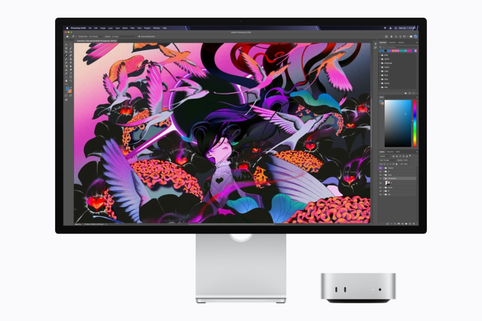 Mac mini with M6 is shown with a display running video editing software.