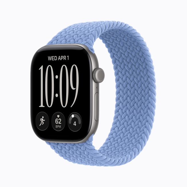Apple Watch Series 12 in space gray aluminum with a wildflower blue Braided Solo Loop band.