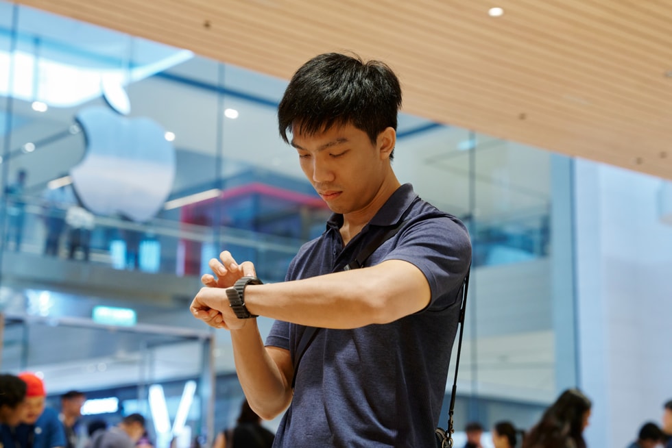 A customer looks at Apple Watch Ultra 4 on their wrist at Apple The Exchange TRX.