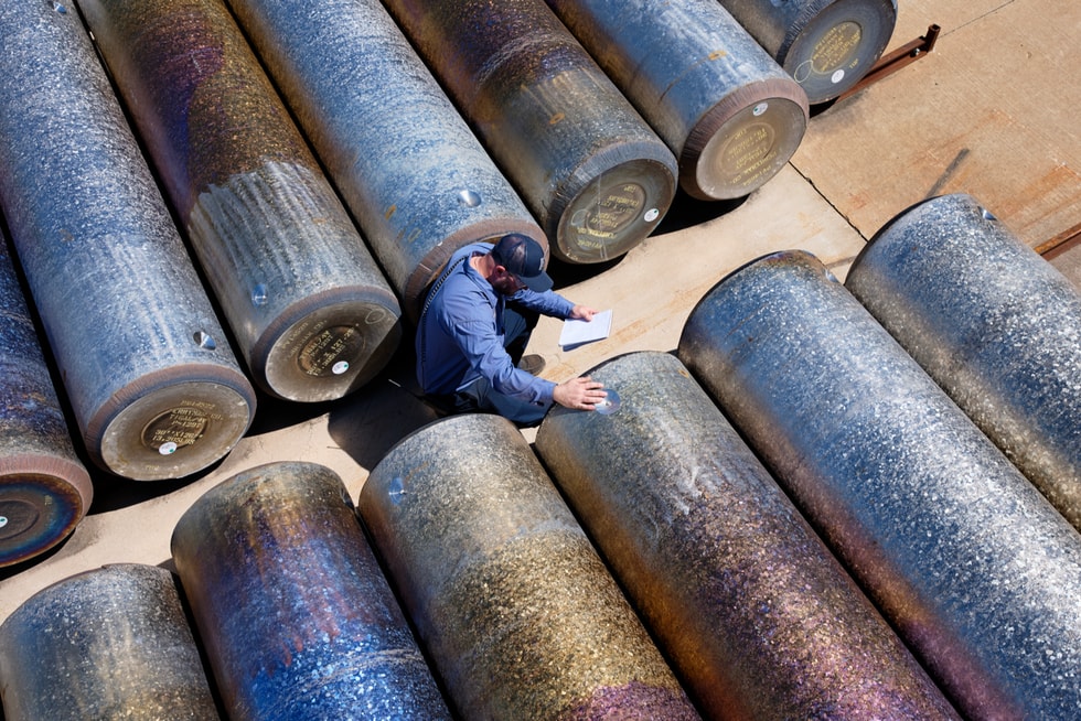 A Perryman Company worker takes inventory of titanium stock.