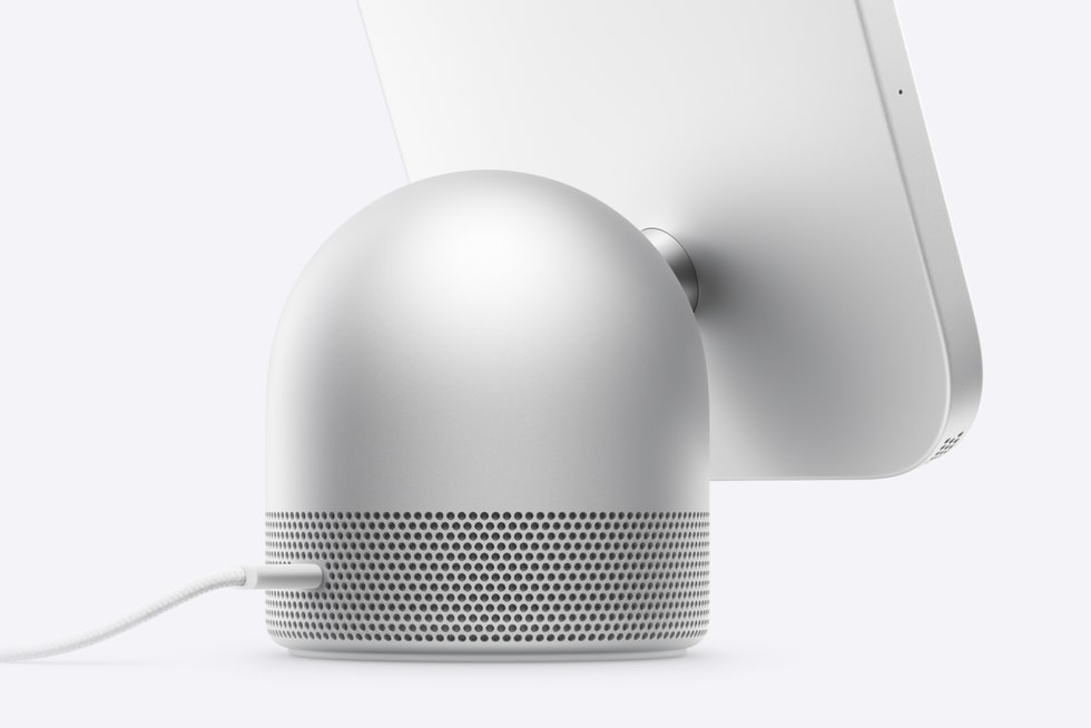 The back of HomeView is shown, complete with ports and a color-matched charging cable.