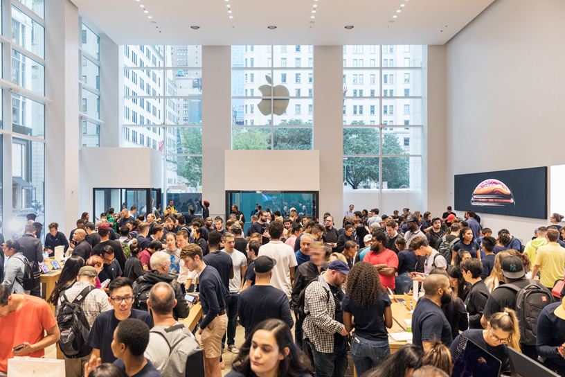 Crowds inside Apple Fifth Avenue in New York City.