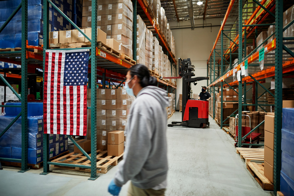 Workers at a COPAN Diagnostics facility.