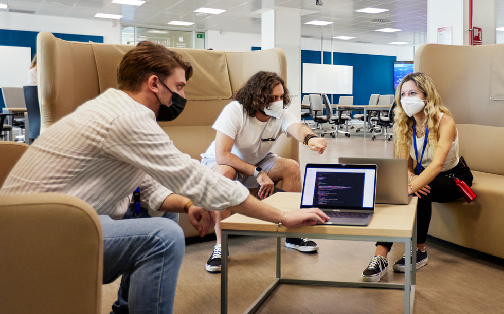 Students collaborate at the Naples Developer Academy.