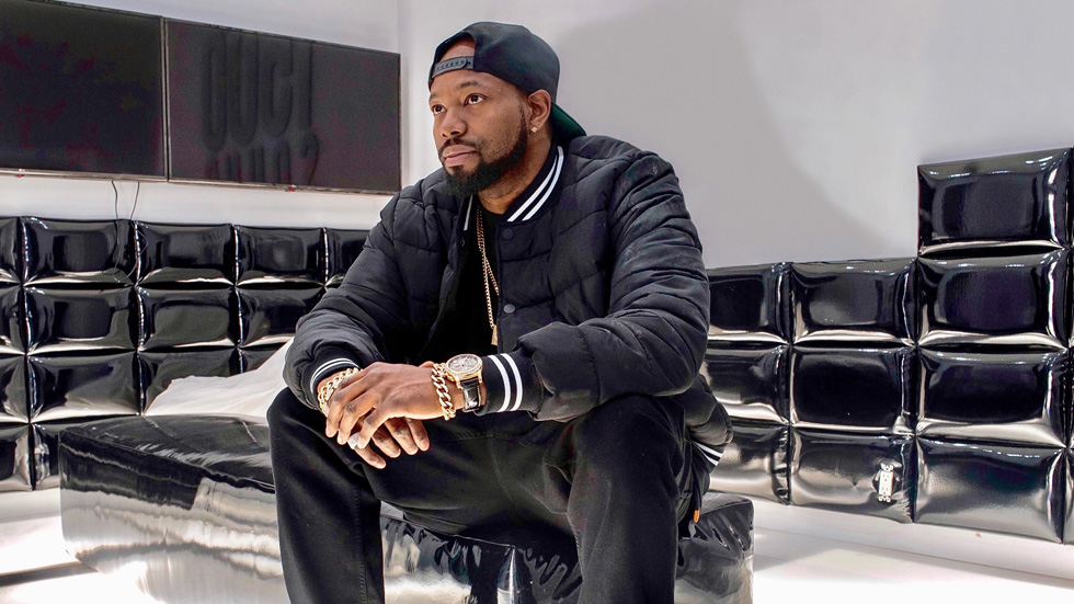 “Rance” Dopson sitting down in a creative space.