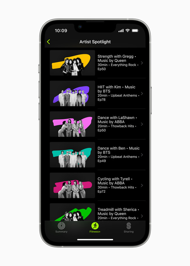 An iPhone screen shows a list of Artist Spotlight workouts.