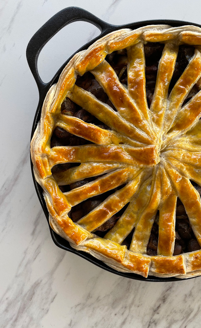 Pie with intricate lattice crust.