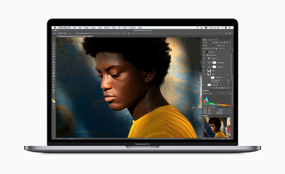 MacBook Pro showing image editing screen in Photoshop.