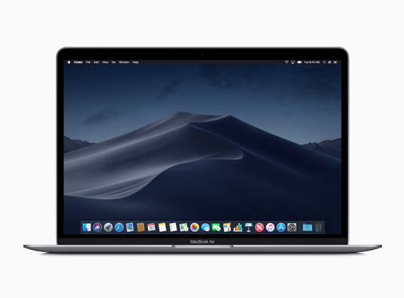 MacBook Air showing MacOS Mojave Dark Mode on screen.