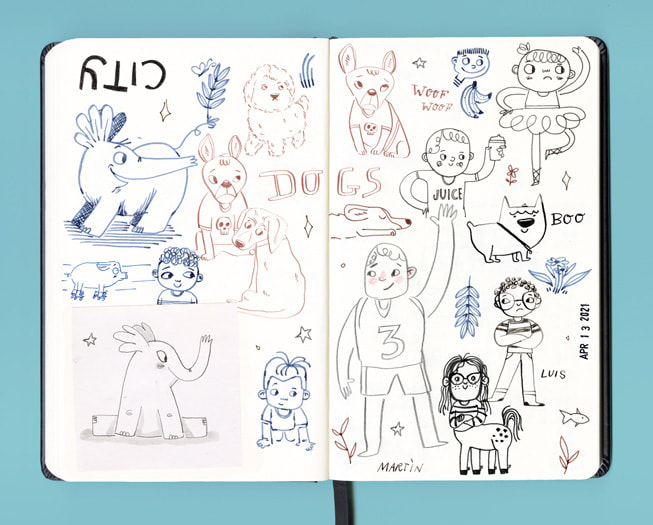 An artist’s open sketchbook is filled with cartoon drawings made in ink.