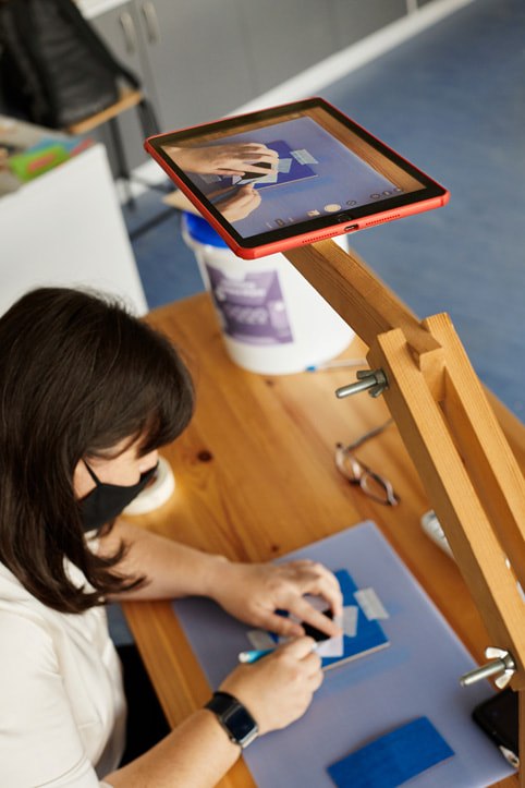 Teacher Lyndsey Balfe instructs students in woodworking.