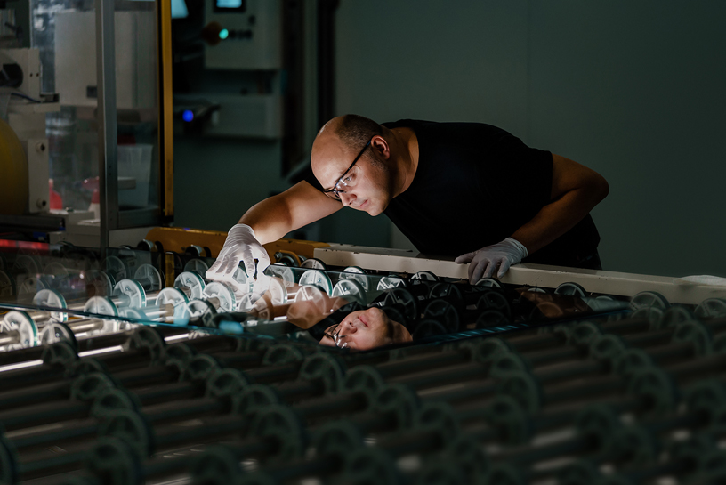 A digital printing shift foreman at an Apple Store glass manufacturer in Germany.