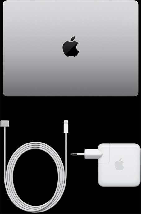 Gümüş rengi MacBook Pro, kapalı durumda ve üstten görünümüyle, şarj kablosu ve adaptörün yanında gösteriliyor