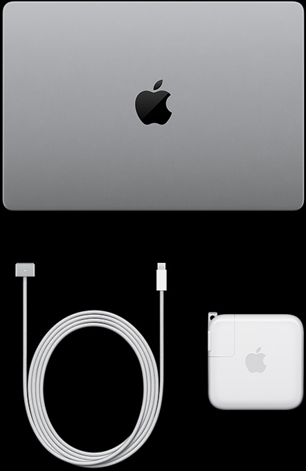 配備 PROLED XDR 顯示器的銀色 MacBook Pro 閉合俯視圖，展示 USB-C 充電連接線與電源轉接器