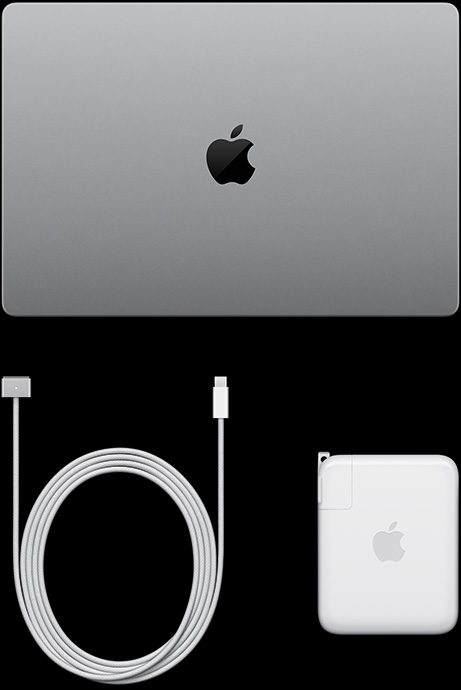 配備 PROLED XDR 顯示器的銀色 MacBook Pro 閉合俯視圖，展示 USB-C 充電連接線與電源轉接器