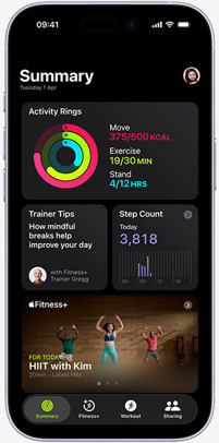 Apple Fitness+ app on an iPhone showing the Summary tab screen, featuring Activity rings, Trainer Tips, Step Count and recommended Apple Fitness+ workouts