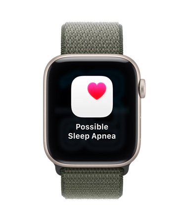 Apple Watch SE 3, alumiiniumkorpus, tähevalge, võimalikust uneapnoest teavitamine, roosa süda valges kastis, parempoolne väliskülg, Digital Crown, Sport Loop, metsaroheline toon