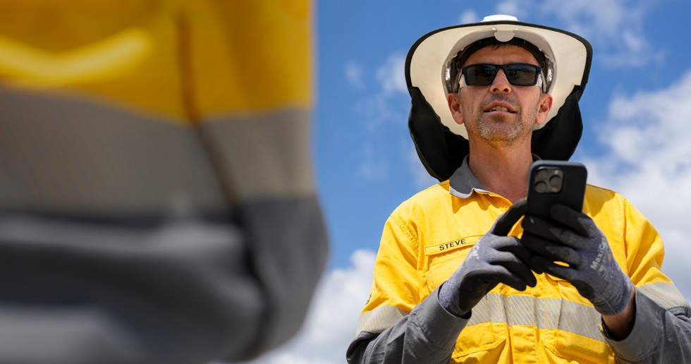 Fieldworkers use iPhone and iPad to assess worksites, collaborate with crew members and check detailed information across many worksite locations