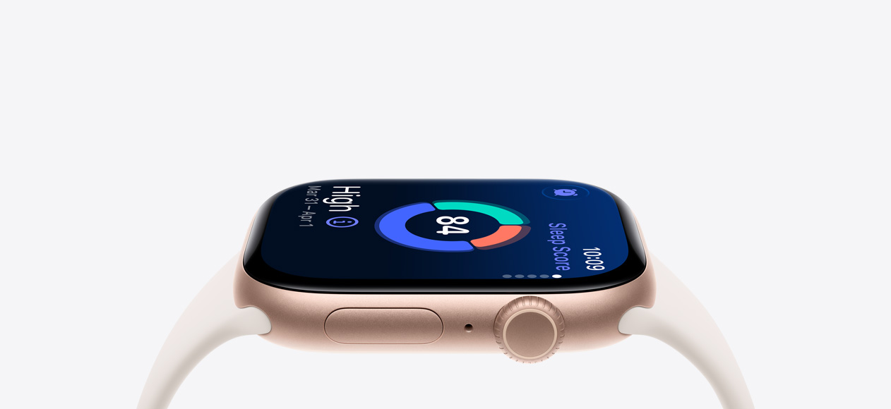 Apple Watch Series 11 med urkasse i aluminium i farven rosaguld, funktionen Søvnresultat, Digital Crown, mikrofon og sideknap i højre side og Sportsrem i farven stjerneskær