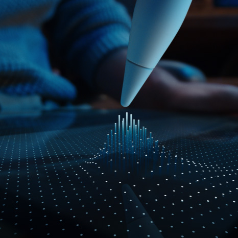 Apple Pencil Pro, color blanco, la punta del dispositivo se acerca a la pantalla de un iPad que muestra una cuadrícula de puntos con algunos elevándose hasta formar columnas que se elevan hacia a la punta del Apple Pencil Pro