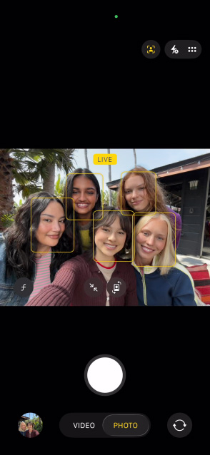 iPhone 17 front screen showing group selfie in Center stage for photos feature