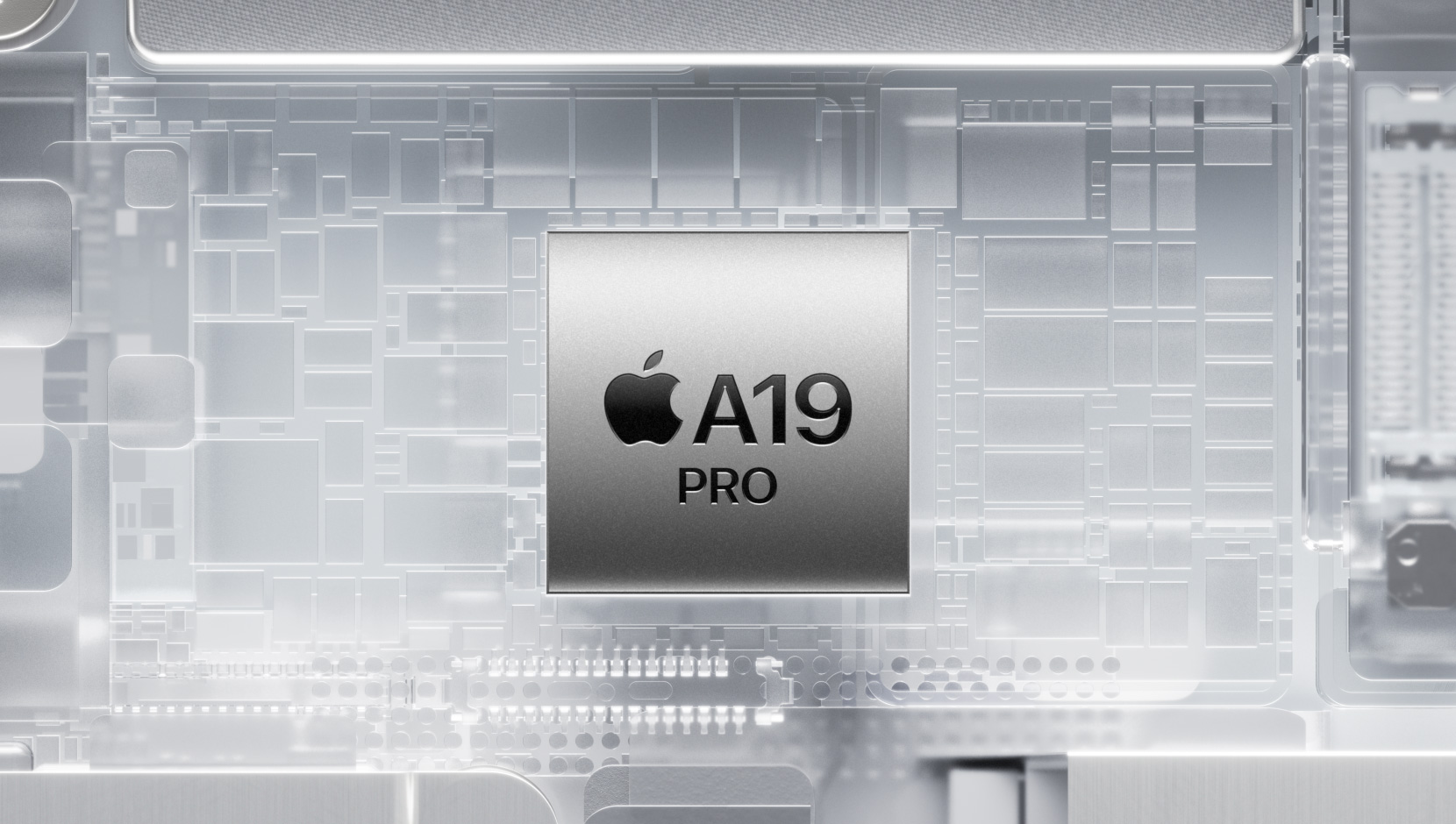 Chip A19 Pro cercado por componentes brilhantes no interior de um iPhone
