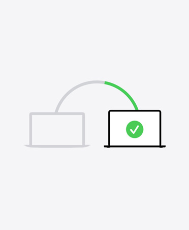 Illustration of two laptops connected by line, second shows green tick onscreen indicating migration process is complete