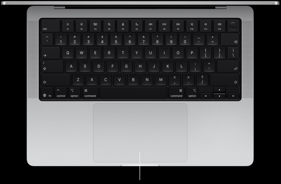 MacBook Pro, silver color, open, showing keyboard and Force Touch trackpad
