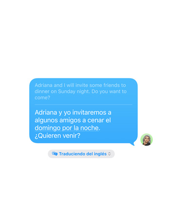 Live Translation in Messages with the user’s text message “Adriana and I will invite some friends to dinner on Sunday night. Do you want to come?” automatically translated into Spanish