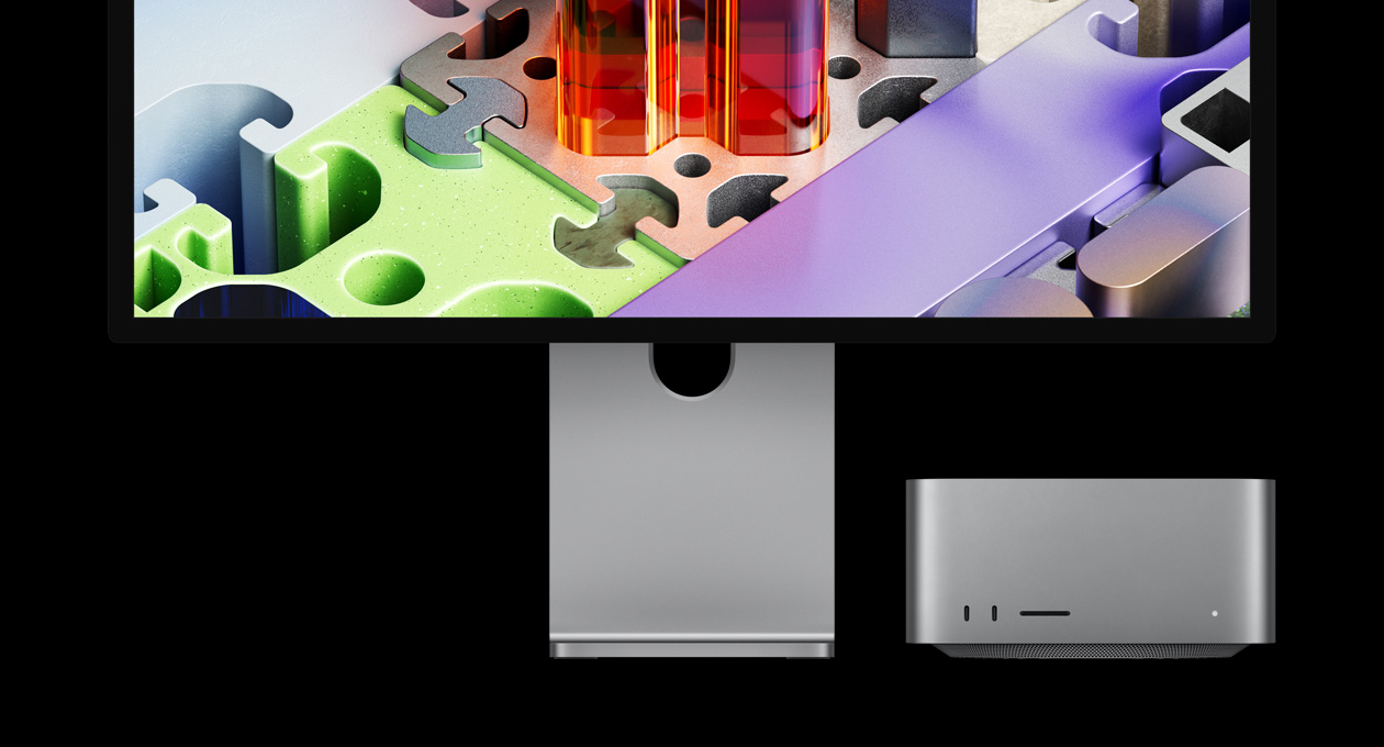 Studio Display XDR egy alatta elhelyezett Mac Studióval: a Studio Display XDR-en egy háromdimenziós kirakószerű háttérkép látható