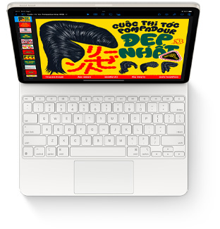 Hình ảnh nhìn từ trên xuống của iPad Air với Magic Keyboard màu trắng cho iPad Air.